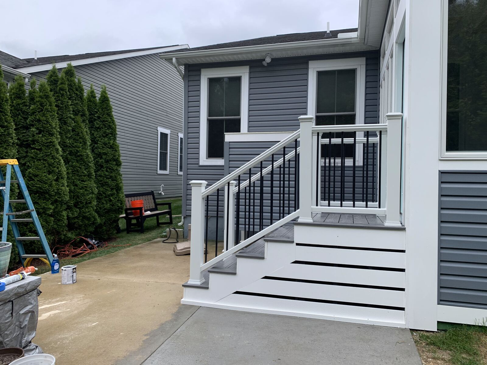 Composite deck and staircase with white rails in Sussex County, DE