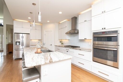 Custom home kitchen with white cabinetry in Sussex County, DE