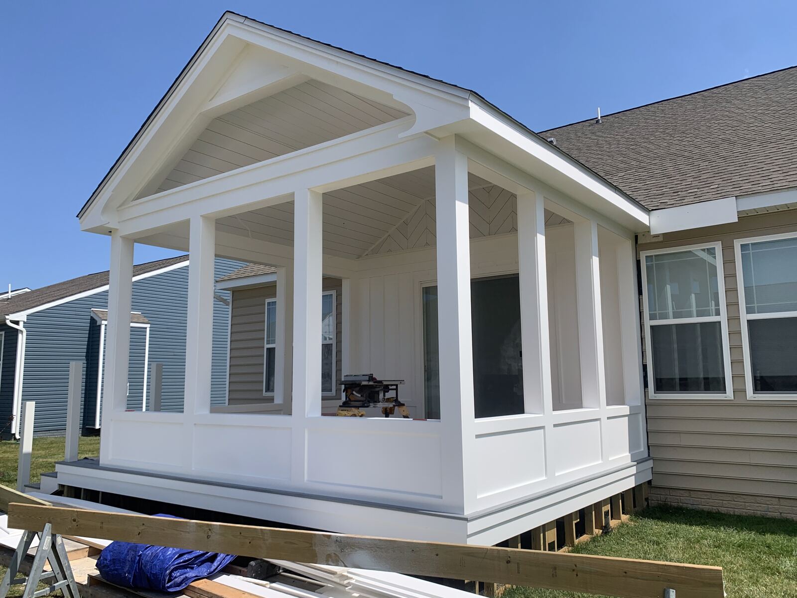 Screened porch under construction with column framing in Lewes, DE