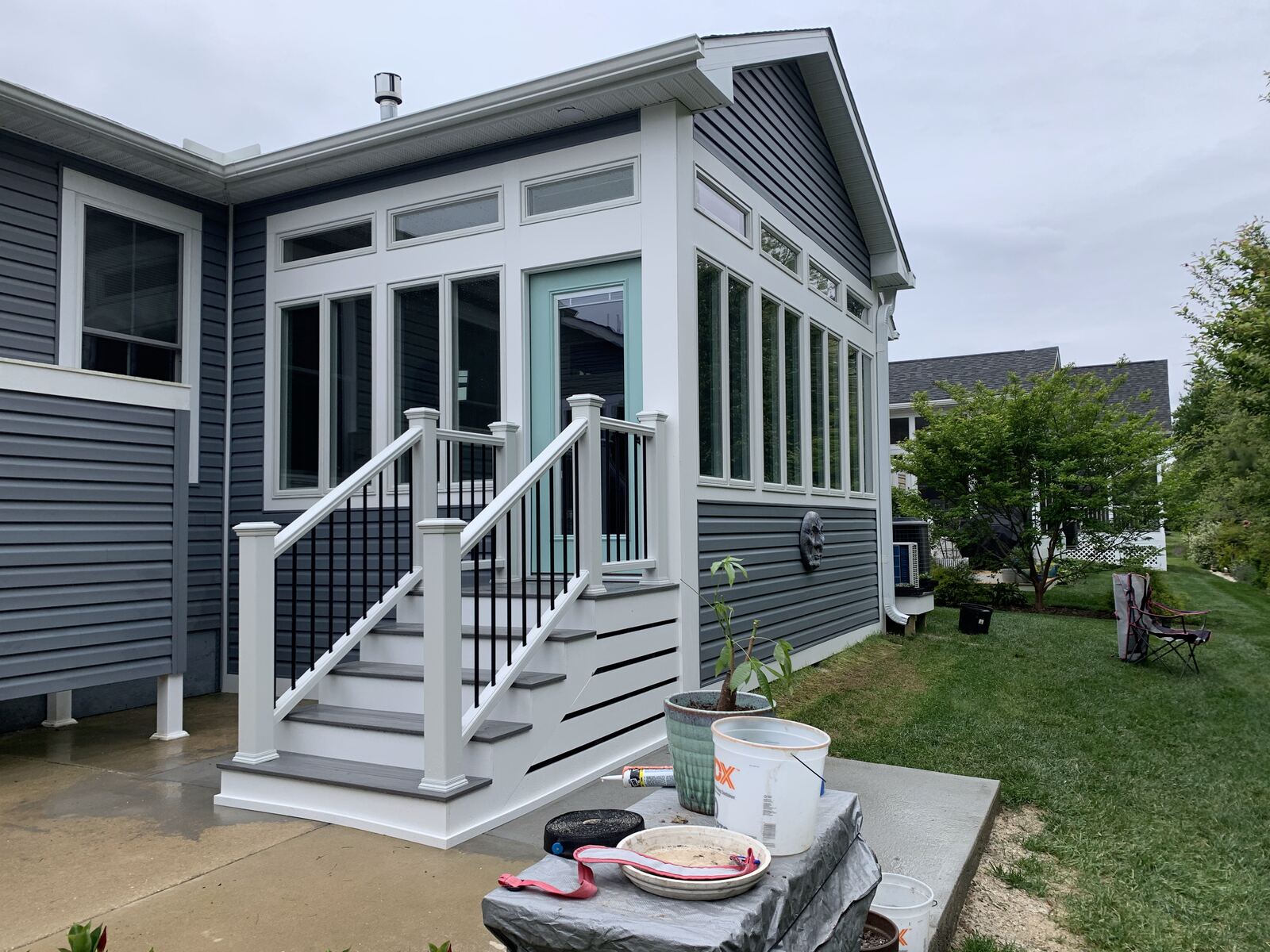 Custom home exterior with composite deck entry in Rehoboth Beach, DE