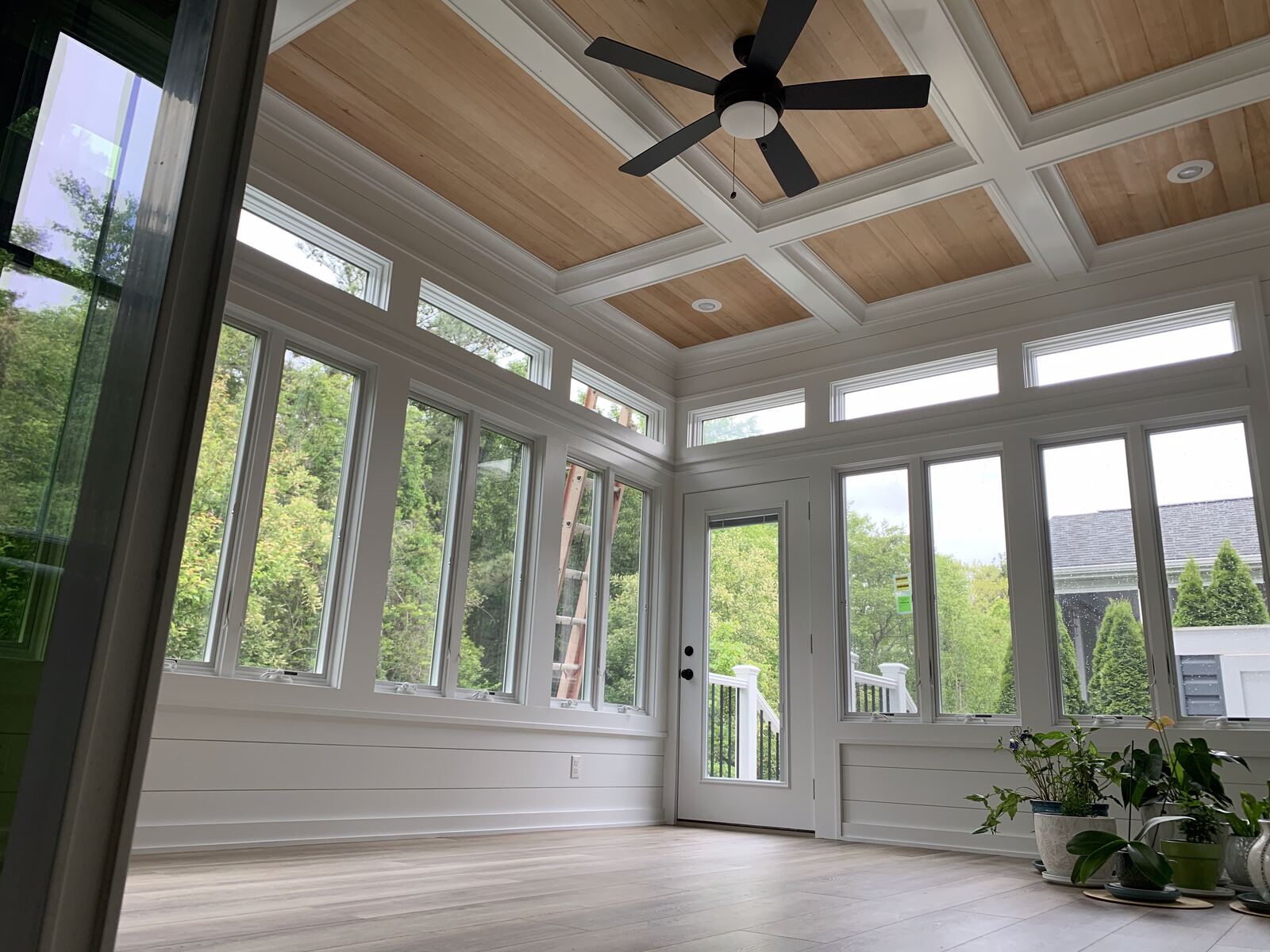 Coffered ceiling and window wall interior from a full-home build in Lewes, DE