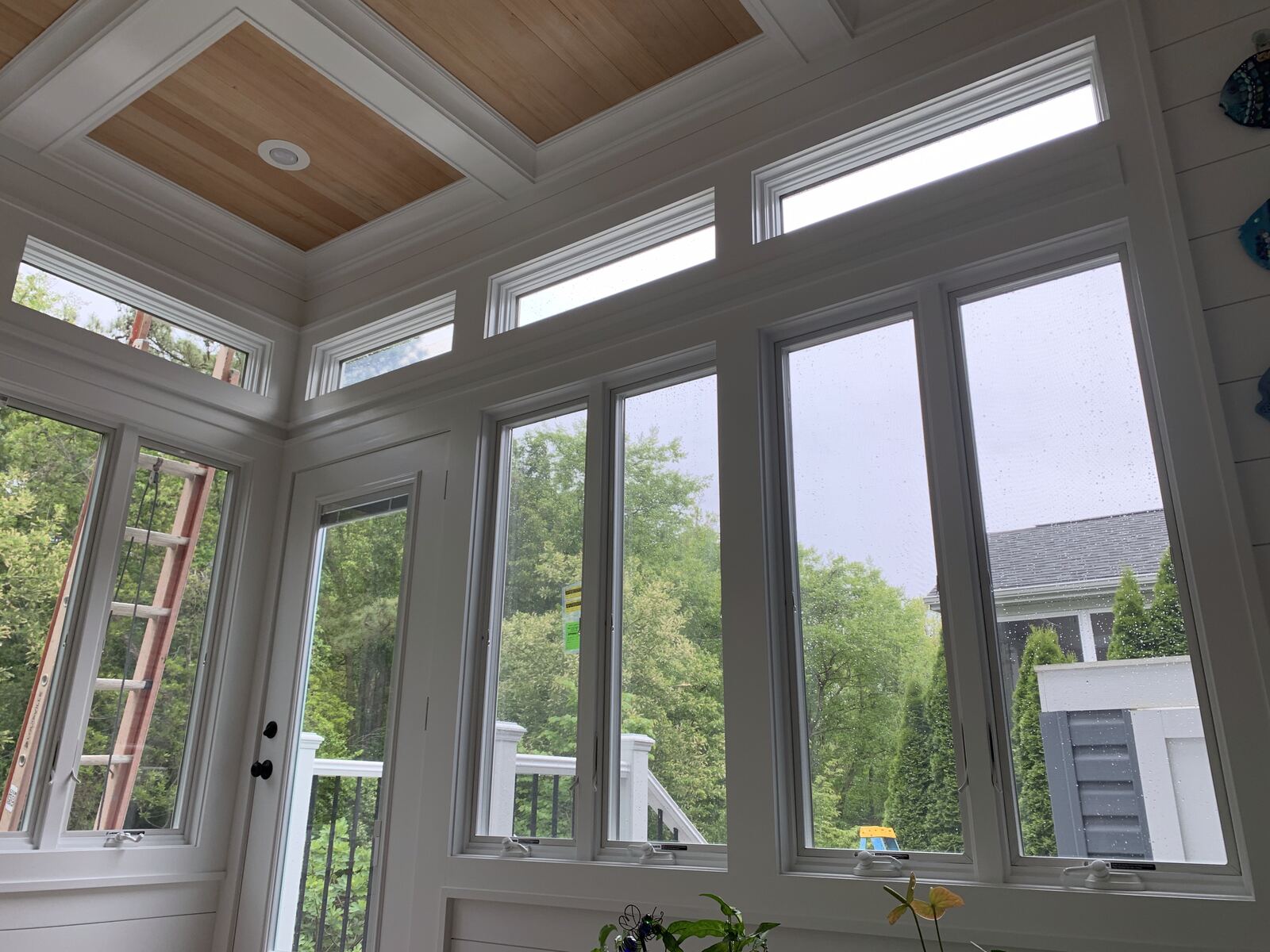 Floor-to-ceiling window wall with transoms in a custom home in Lewes, DE