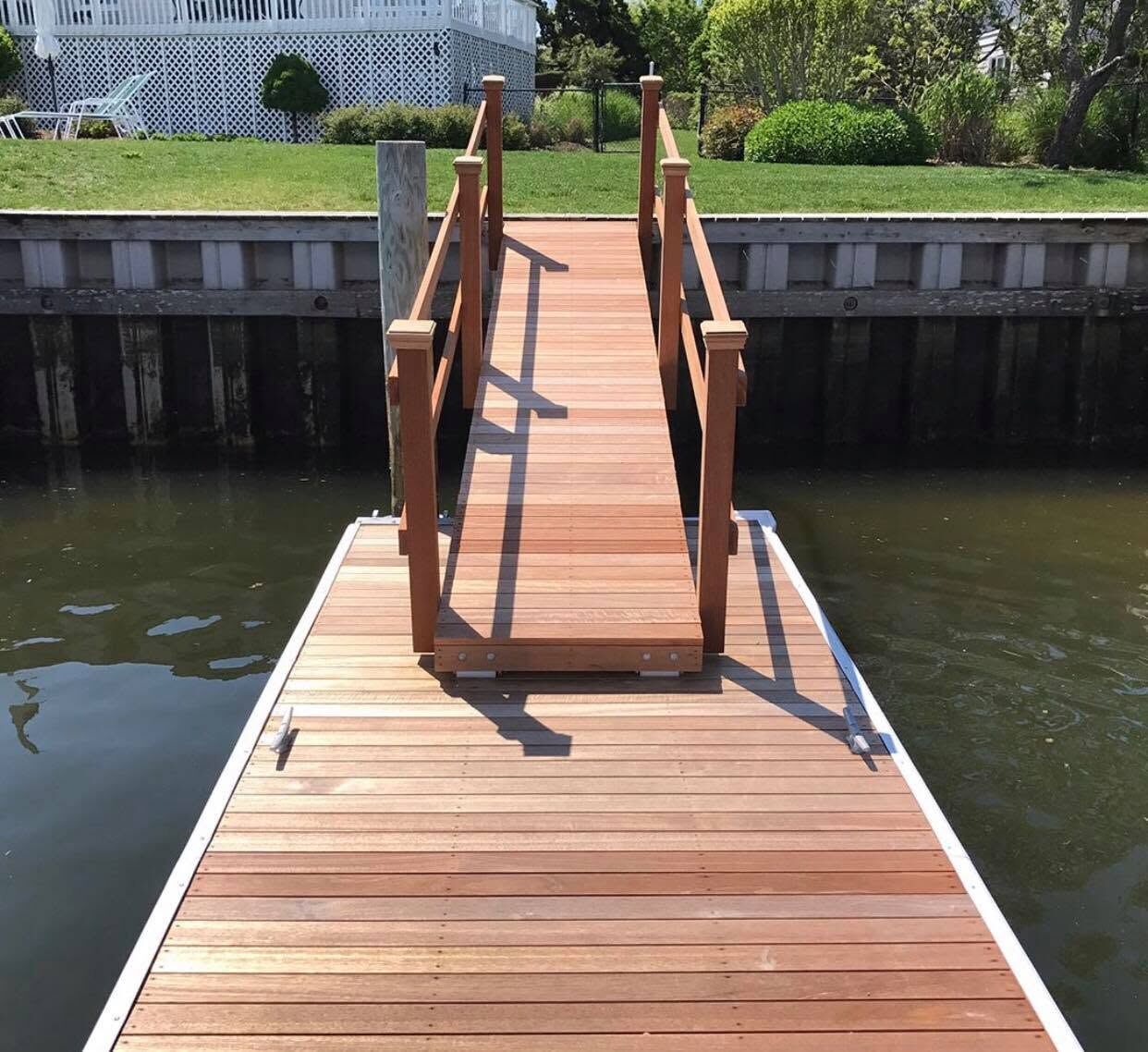 Waterfront dock with mahogany decking and railings in Sussex County, DE